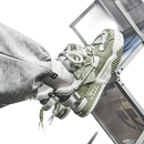 Olive green and white patterned sneakers.