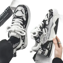 Black and white patterned sneakers.