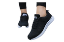 Black athletic shoes with white soles.