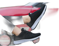 Black athletic shoes with white soles.