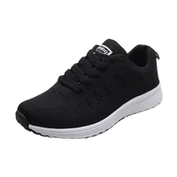 Black running shoe with white sole.