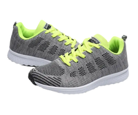 Gray and neon yellow running shoes.