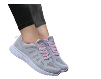 Gray and pink athletic shoes.