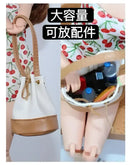 Miniature bucket bag with contents.