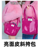 Shiny pink handbag.