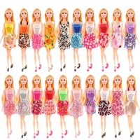 Twenty fashion dolls in colorful dresses.