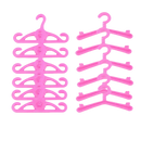 Pink plastic doll hangers.