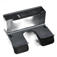 Black metal organizer with compartments and a U-shaped base.
