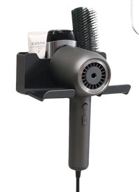 Gray hair dryer and accessories holder.