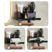 Hair dryer holder with accessories.