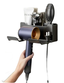Wall-mounted hair dryer and accessories organizer.