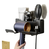 Wall-mounted hair styling tool organizer.