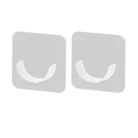 Two adhesive curtain rod holders.