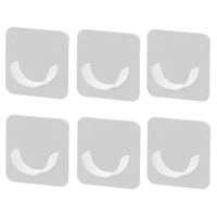Six clear adhesive hooks.