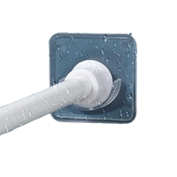 Adhesive towel bar holder.