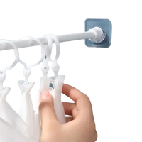 White plastic clothes drying rack.