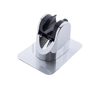 Chrome shower head holder with adhesive base.