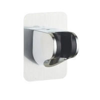 Chrome shower head holder with adhesive backing.