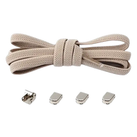 Khaki shoelaces with metal locks.