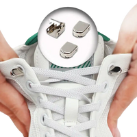 Metal shoelace clips.