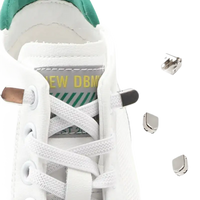 White sneaker with metal lace locks.
