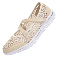 Beige lace-covered slip-on shoe.