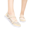 Beige lace-patterned walking shoes.