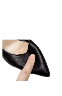 Black leather pointed-toe heels perfect for outdoor elegant and trendy outfits
