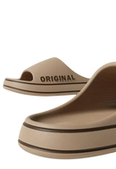 Beige platform slide sandals.