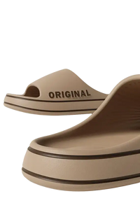 Beige platform slide sandals.