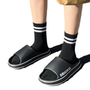 Black slides with white trim.