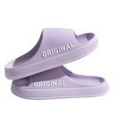Lavender-colored slide sandals.