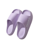 Pair of lavender-colored slide sandals.
