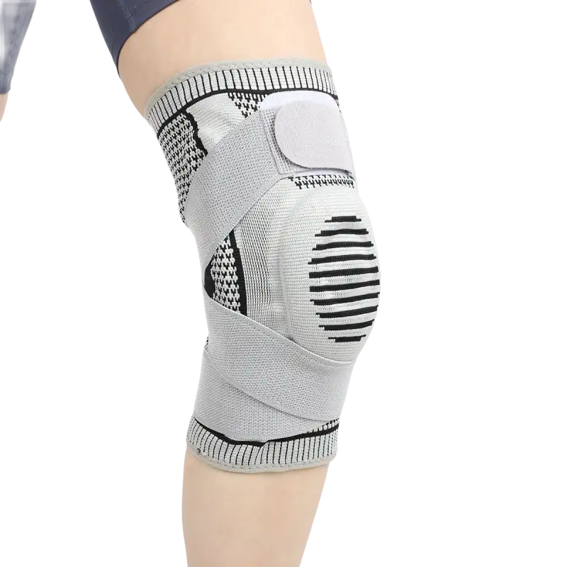 Gray knee brace with straps.