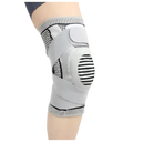 Gray knee brace with straps.