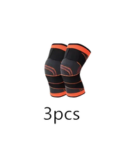 Pair of black and orange knee braces.