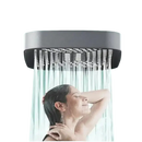 Dual-use shower head with water flowing.