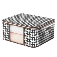 Houndstooth patterned storage box.