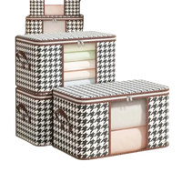Houndstooth patterned storage boxes.