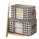 Two houndstooth storage boxes.