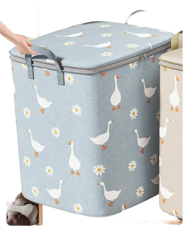 Goose and daisy patterned storage bin with lid.