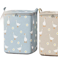 Goose-patterned, zippered storage bins.