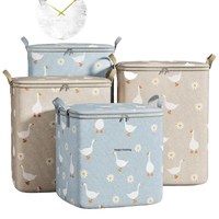 Goose-patterned, zippered storage bins.
