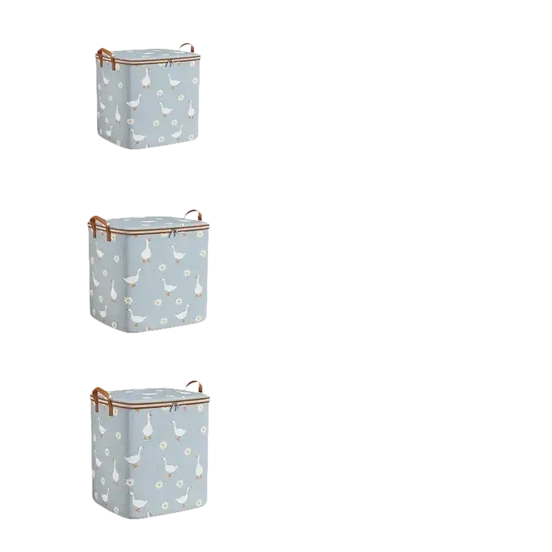 Three sizes of goose-patterned laundry hampers with lids.