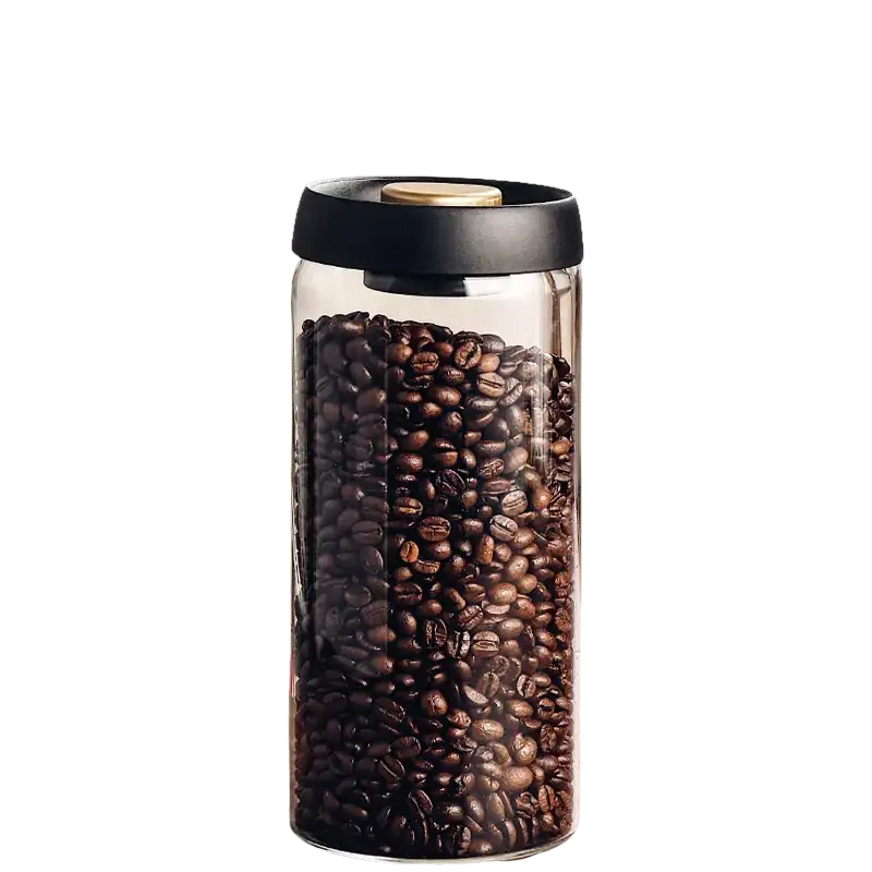 Coffee bean-filled glass jar with black lid.