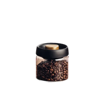 Coffee bean storage jar.