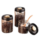 Coffee bean storage jars.