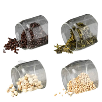Four glass containers with various food items.