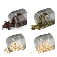 Four glass containers with various food items.