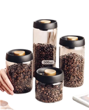 Glass storage jars with coffee beans.